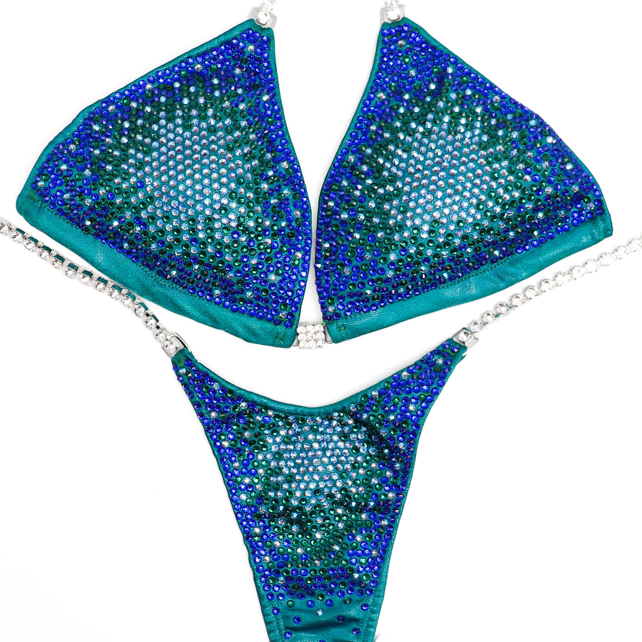 The Planet Earth Nova competition suit, designed for NPC Bikini competitors seeking the pinnacle of performance and style. Crafted with precision and inspired by Ashley Kaltwasser, this suit embodies elegance and strength. Dominate the stage with confidence in this unparalleled fusion of beauty and functionality.