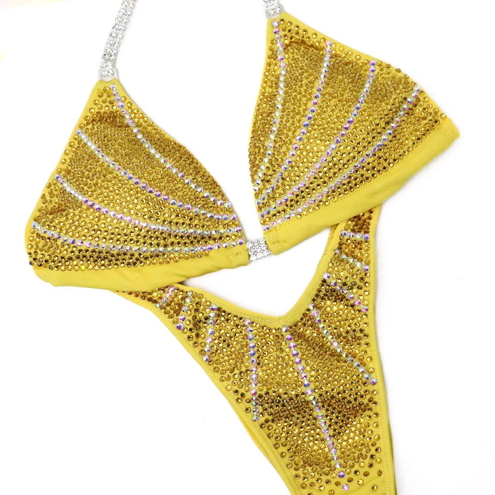yellow competition suit that the npc bikini judges and ifbb bikini judges and npc wellness judges love.