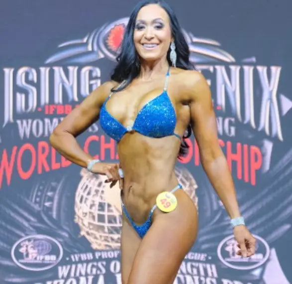 "Introducing Isa's Aquamarine Dream Radiance: The ultimate suit to illuminate your stage presence. Designed to bring out confidence in all female bodybuilders, this ensemble shines with regal elegance, empowering you to own the spotlight with grace and power. 💎✨ #FemaleBodybuilding #StageConfidence"