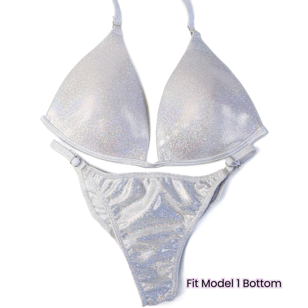 Pre Owned: Hologram White Fit Model Bundle. Medium Molded.  Angel Competition BikinisThe best NPC Competition Suits for the Bikini Division, Fit Model Division Suits, and bodybuilding suits.