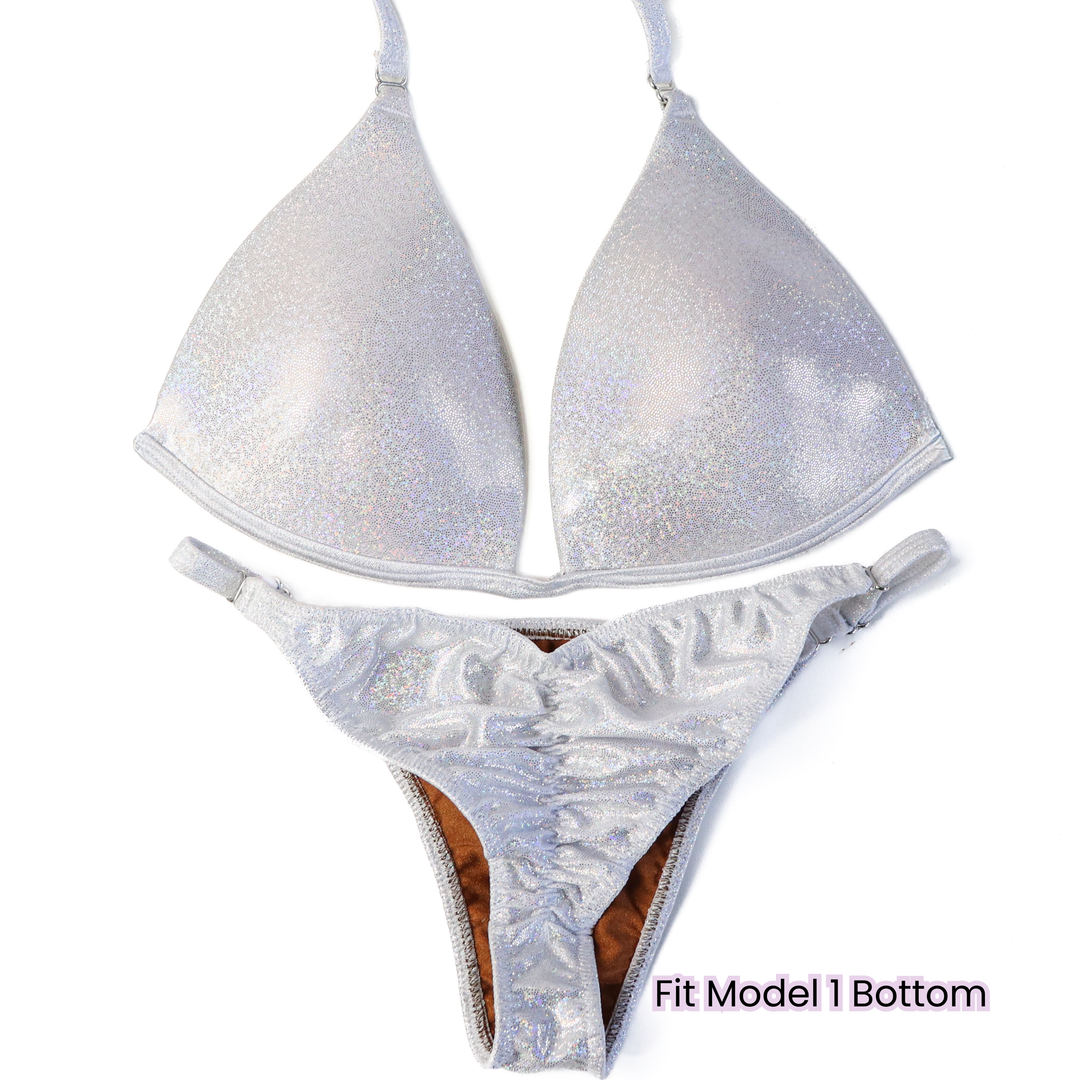Pre Owned: Hologram White Fit Model Bundle. Medium Molded.  Angel Competition BikinisThe best NPC Competition Suits for the Bikini Division, Fit Model Division Suits, and bodybuilding suits.