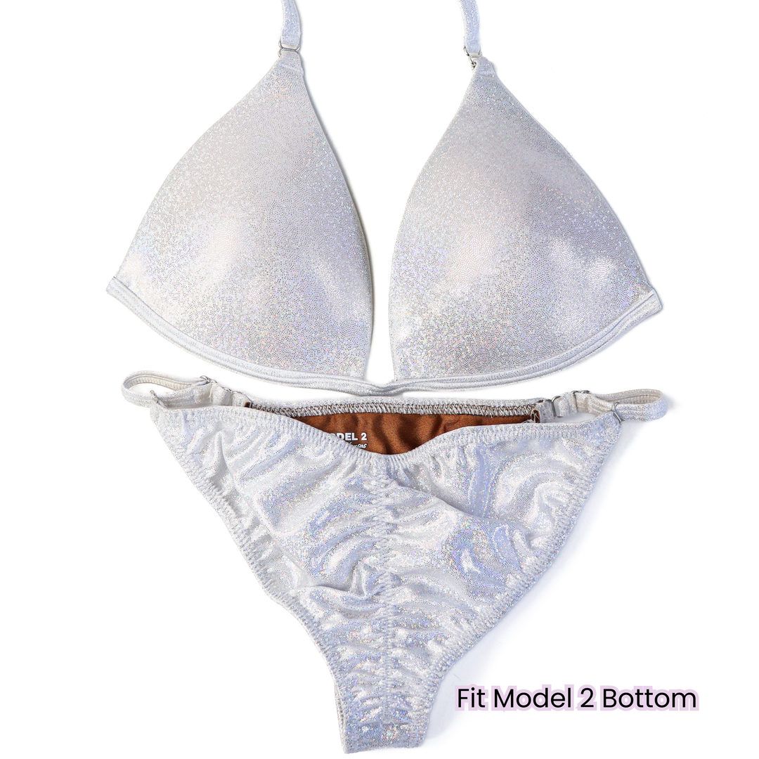 Pre Owned: Hologram White Fit Model Bundle. Medium Molded.  Angel Competition BikinisThe best NPC Competition Suits for the Bikini Division, Fit Model Division Suits, and bodybuilding suits.