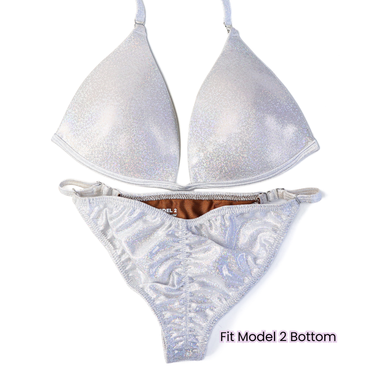 Pre Owned: Hologram White Fit Model Bundle. Medium Molded.  Angel Competition BikinisThe best NPC Competition Suits for the Bikini Division, Fit Model Division Suits, and bodybuilding suits.