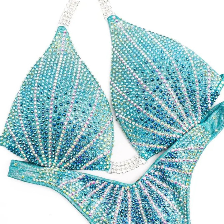 Aqua Cosmo  Angel Competition BikinisThe best NPC Competition Suits for the Bikini Division, Fit Model Division Suits, and bodybuilding suits.