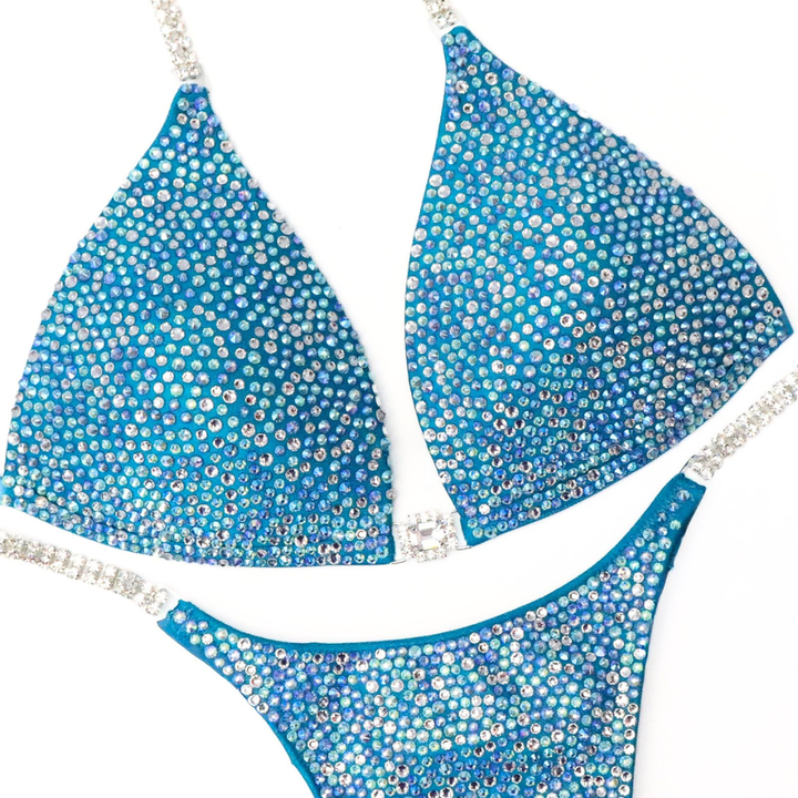 Ice Queen Turquoise Radiance  Angel Competition BikinisThe best NPC Competition Suits for the Bikini Division, Fit Model Division Suits, and bodybuilding suits.