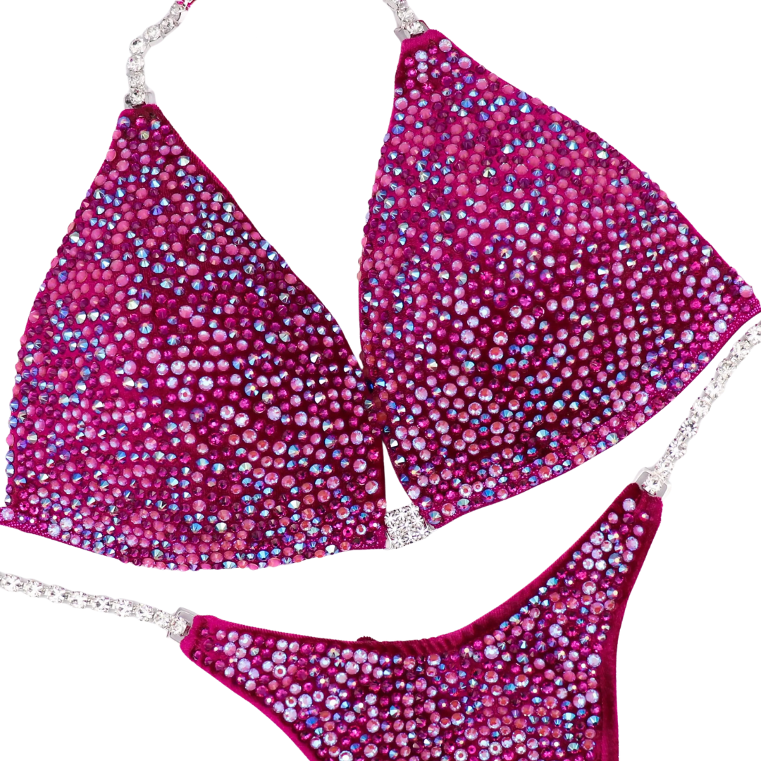 Victoria's Arnold Velvet Magenta Radiance  Angel Competition BikinisThe best NPC Competition Suits for the Bikini Division, Fit Model Division Suits, and bodybuilding suits.