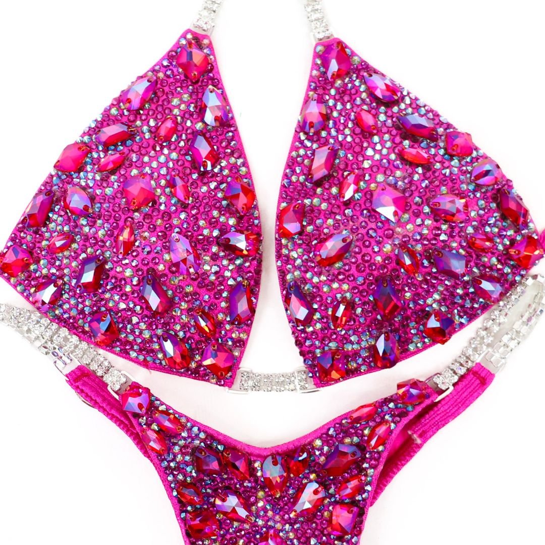 Custom Platinum Pro in vibrant pink for NPC bikini competition suit and custom competition bikinis with gemstone effect