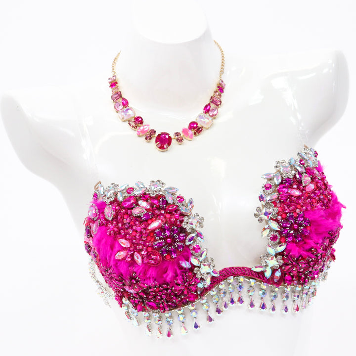 Pre Owned: Savana's Hot Pink Couture. Medium Molded/Pro with Modest Rise.  Angel Competition BikinisThe best NPC Competition Suits for the Bikini Division, Fit Model Division Suits, and bodybuilding suits.