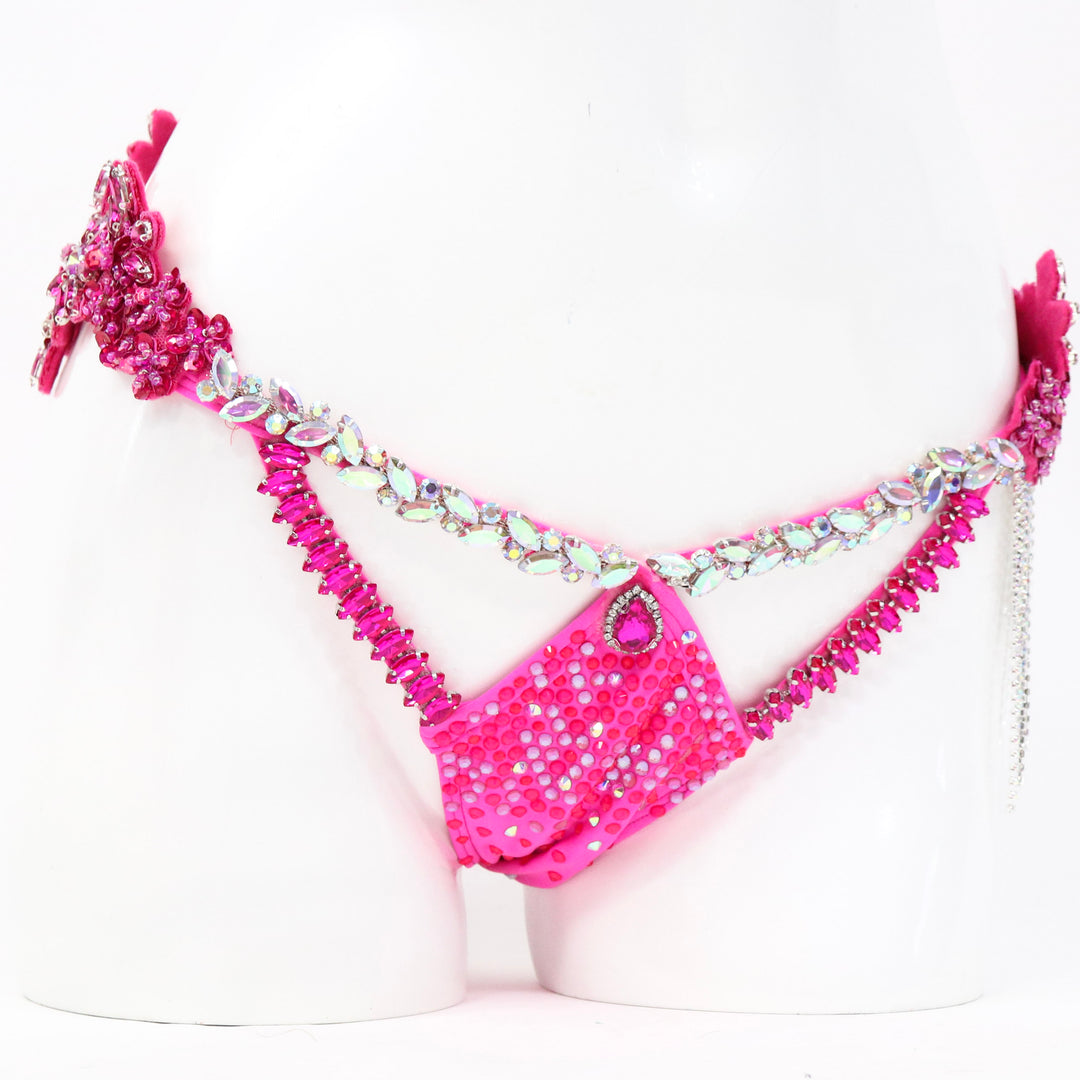 Pre Owned: Savana's Hot Pink Couture. Medium Molded/Pro with Modest Rise.  Angel Competition BikinisThe best NPC Competition Suits for the Bikini Division, Fit Model Division Suits, and bodybuilding suits.