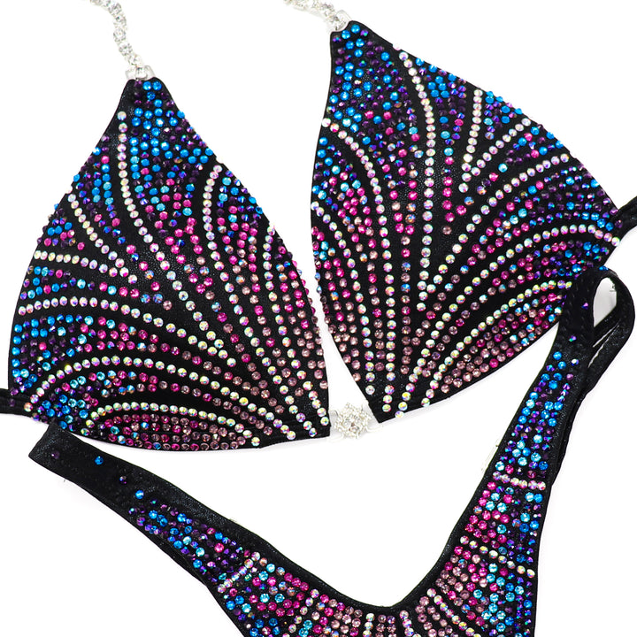 Ninoska's Dark Cotton Candy Crystal Spark  Angel Competition BikinisThe best NPC Competition Suits for the Bikini Division, Fit Model Division Suits, and bodybuilding suits.