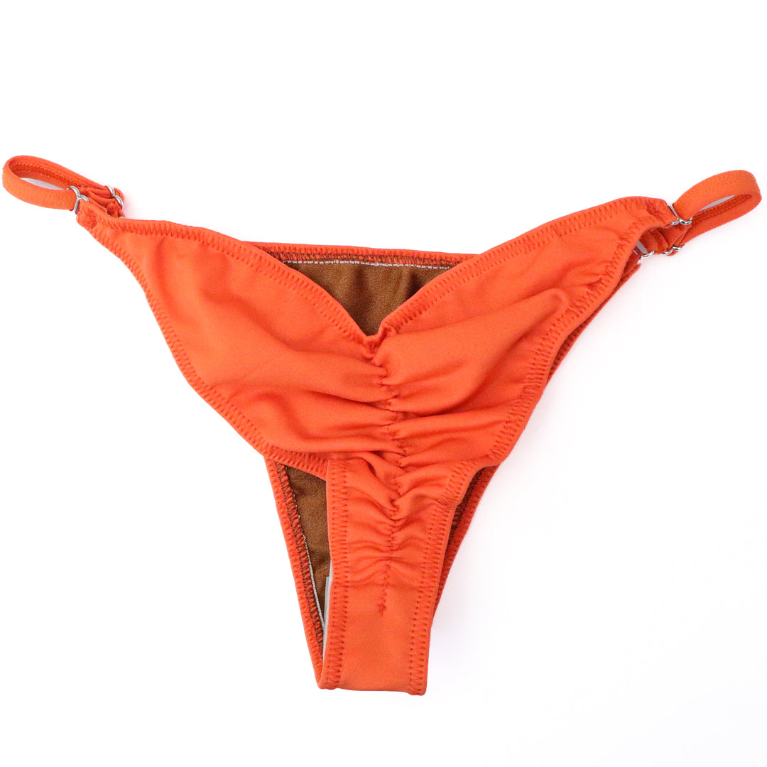 QS ST: Matte Orange Fit Model Suit. Medium Molded/Fit Model 1.