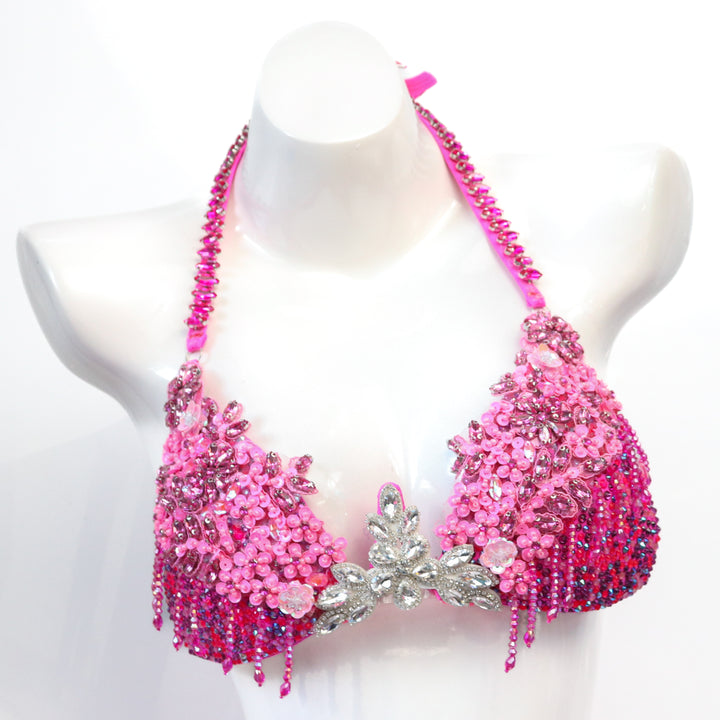 Pre Owned: Pink Fringe Couture. Medium Molded/Pro with Modest Rise.  Angel Competition BikinisThe best NPC Competition Suits for the Bikini Division, Fit Model Division Suits, and bodybuilding suits.