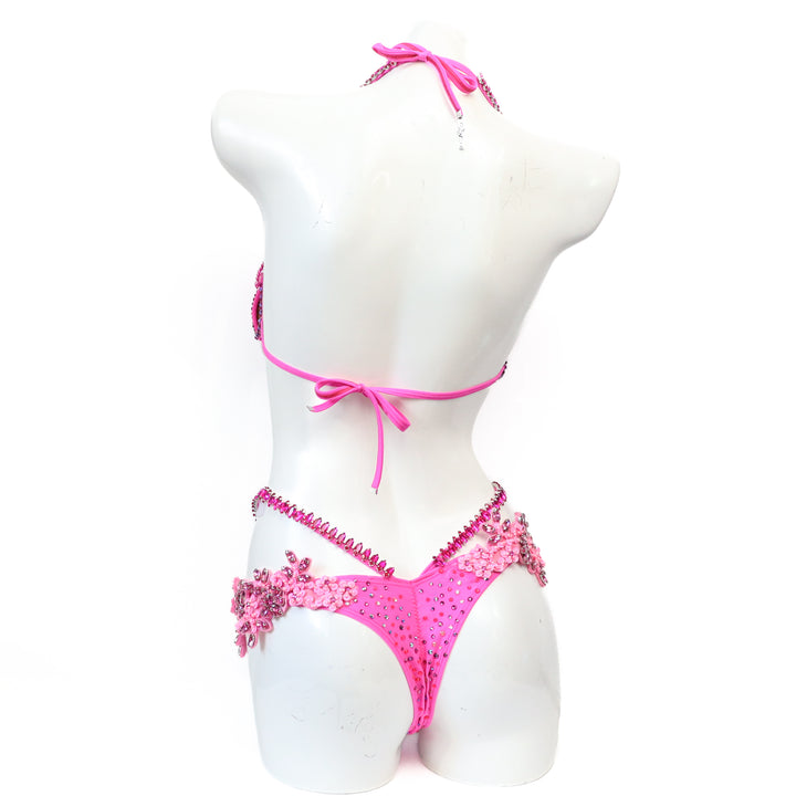 Pre Owned: Pink Fringe Couture. Medium Molded/Pro with Modest Rise.  Angel Competition BikinisThe best NPC Competition Suits for the Bikini Division, Fit Model Division Suits, and bodybuilding suits.