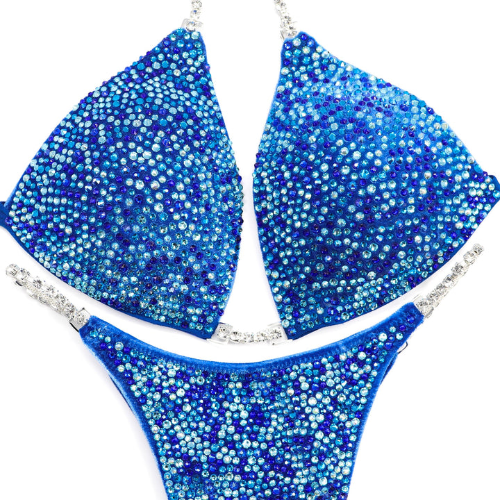Velvet Royal Radiance blue velvet bikini set with aqua, sapphire, and capri crystals for NPC bikini competition suits