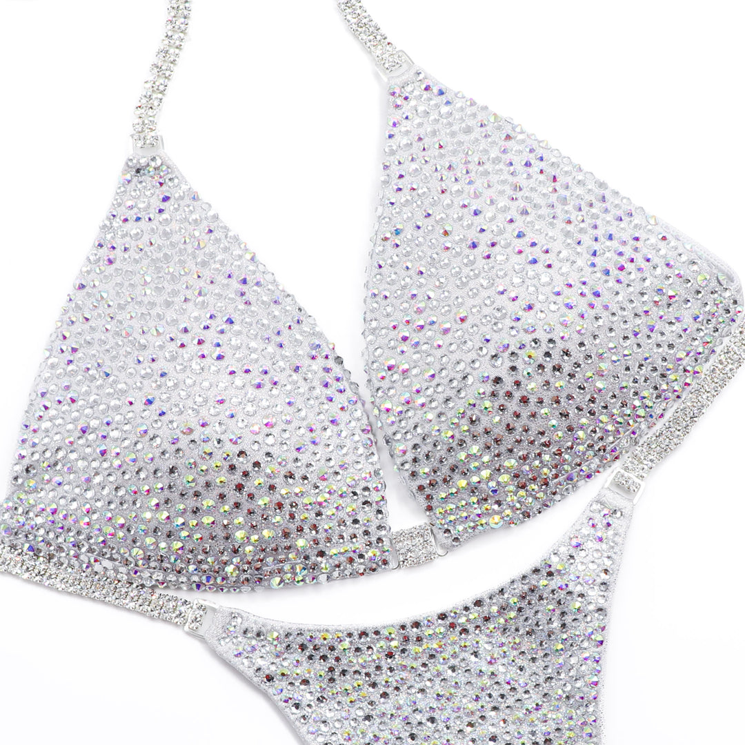 White Goddess Radiance  Angel Competition BikinisThe best NPC Competition Suits for the Bikini Division, Fit Model Division Suits, and bodybuilding suits.