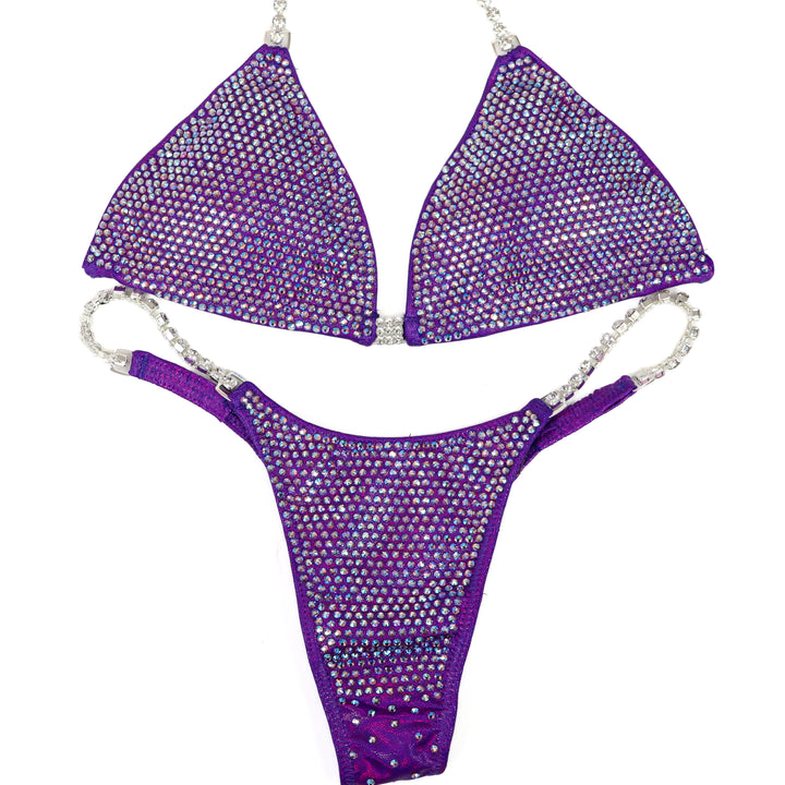 QS ST: Angel Pro. Hologram Purple. Light Amethyst AB. Small/Micro.  Angel Competition BikinisThe best NPC Competition Suits for the Bikini Division, Fit Model Division Suits, and bodybuilding suits.
