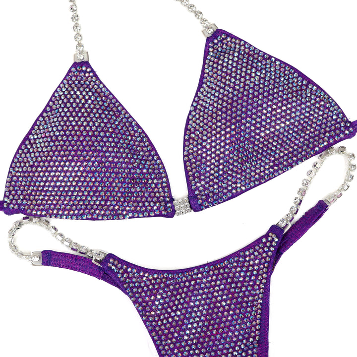 QS ST: Angel Pro. Hologram Purple. Light Amethyst AB. Small/Micro.  Angel Competition BikinisThe best NPC Competition Suits for the Bikini Division, Fit Model Division Suits, and bodybuilding suits.