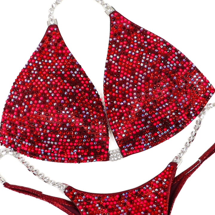 QS ST: Ruby Rave Angel Pro. Hologram Maroon. Medium Molded/Pro.  Angel Competition BikinisThe best NPC Competition Suits for the Bikini Division, Fit Model Division Suits, and bodybuilding suits.