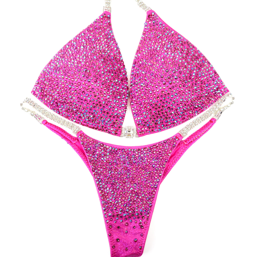 QS ST: Lucia's Pink Radiance. Hologram Pink. Medium Molded/Pro.  Angel Competition BikinisThe best NPC Competition Suits for the Bikini Division, Fit Model Division Suits, and bodybuilding suits.