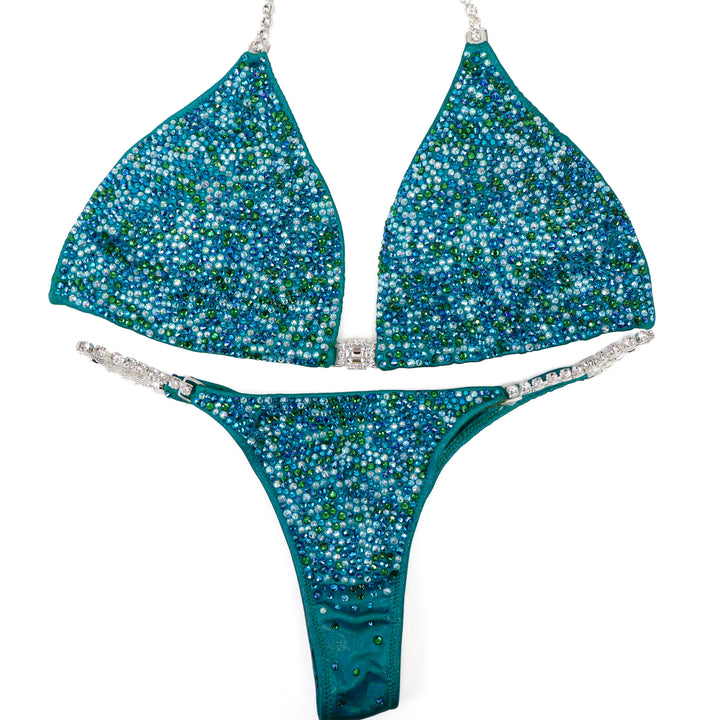 QS ST: Mary Ann's Green Radiance. Large/Olympian with Modest Rise.  Angel Competition BikinisThe best NPC Competition Suits for the Bikini Division, Fit Model Division Suits, and bodybuilding suits.