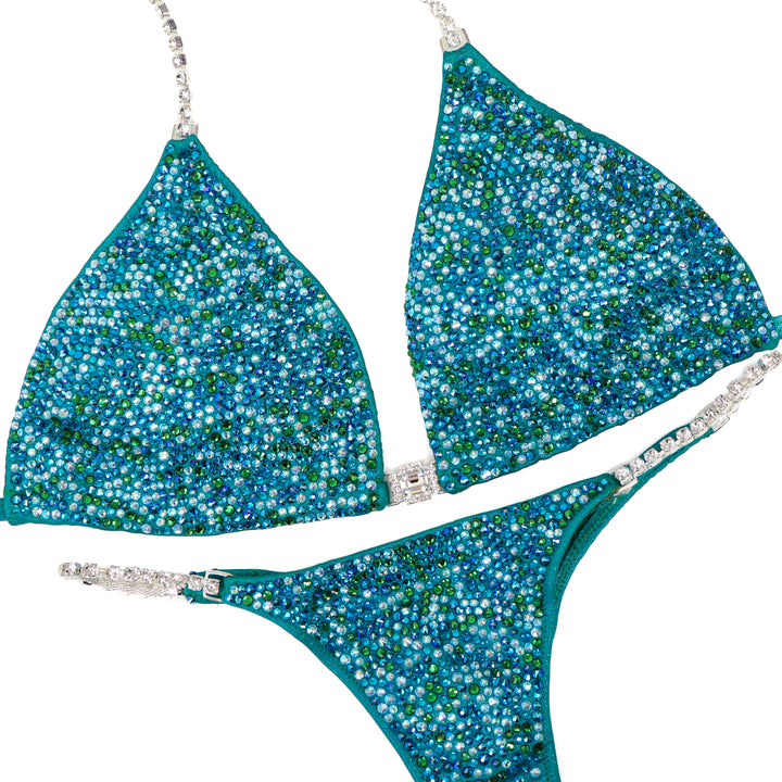 QS ST: Mary Ann's Green Radiance. Large/Olympian with Modest Rise.  Angel Competition BikinisThe best NPC Competition Suits for the Bikini Division, Fit Model Division Suits, and bodybuilding suits.