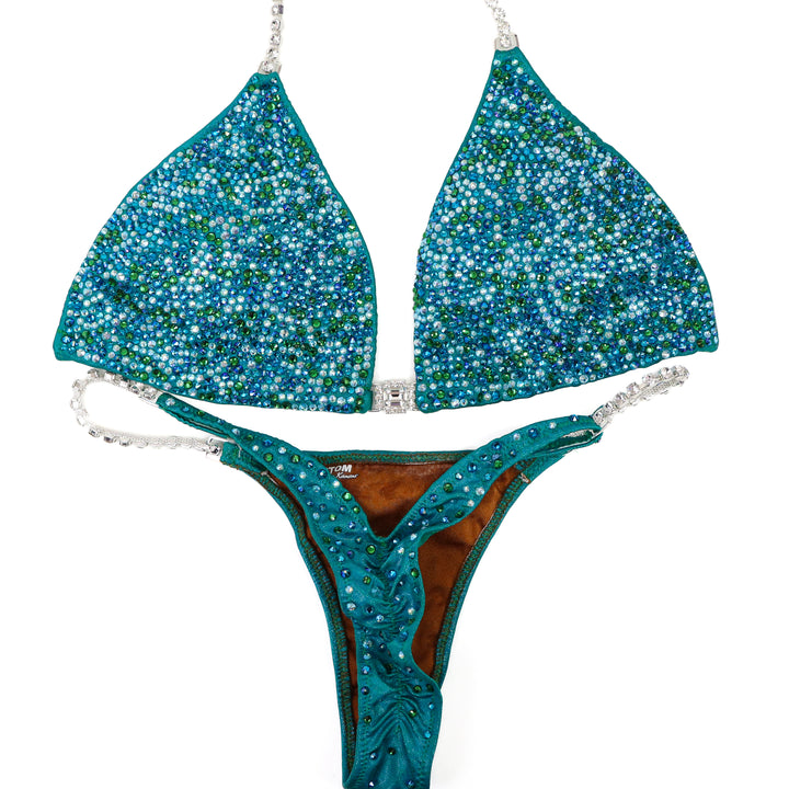 QS ST: Mary Ann's Green Radiance. Large/Olympian with Modest Rise.  Angel Competition BikinisThe best NPC Competition Suits for the Bikini Division, Fit Model Division Suits, and bodybuilding suits.