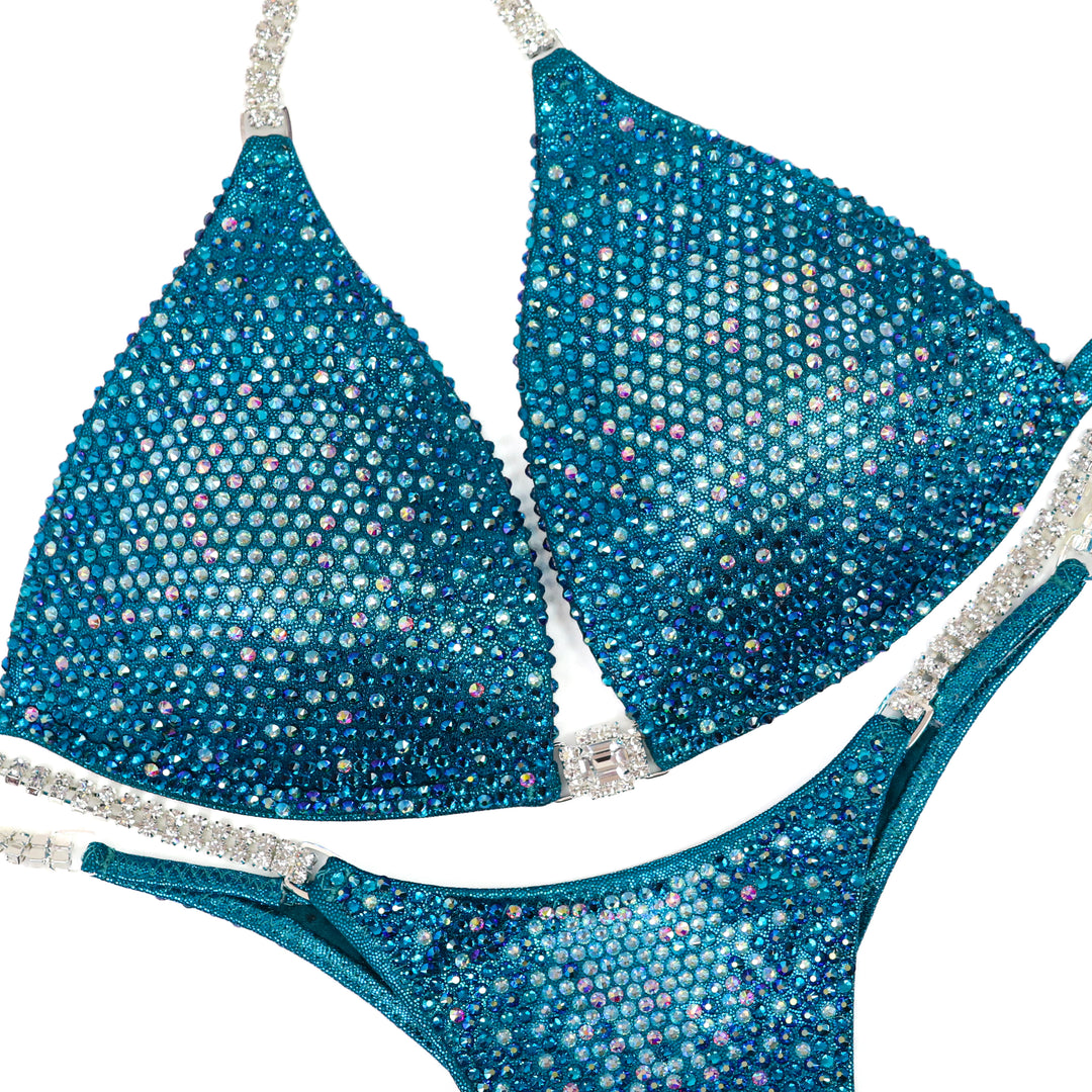 Teal Nova  Angel Competition BikinisThe best NPC Competition Suits for the Bikini Division, Fit Model Division Suits, and bodybuilding suits.
