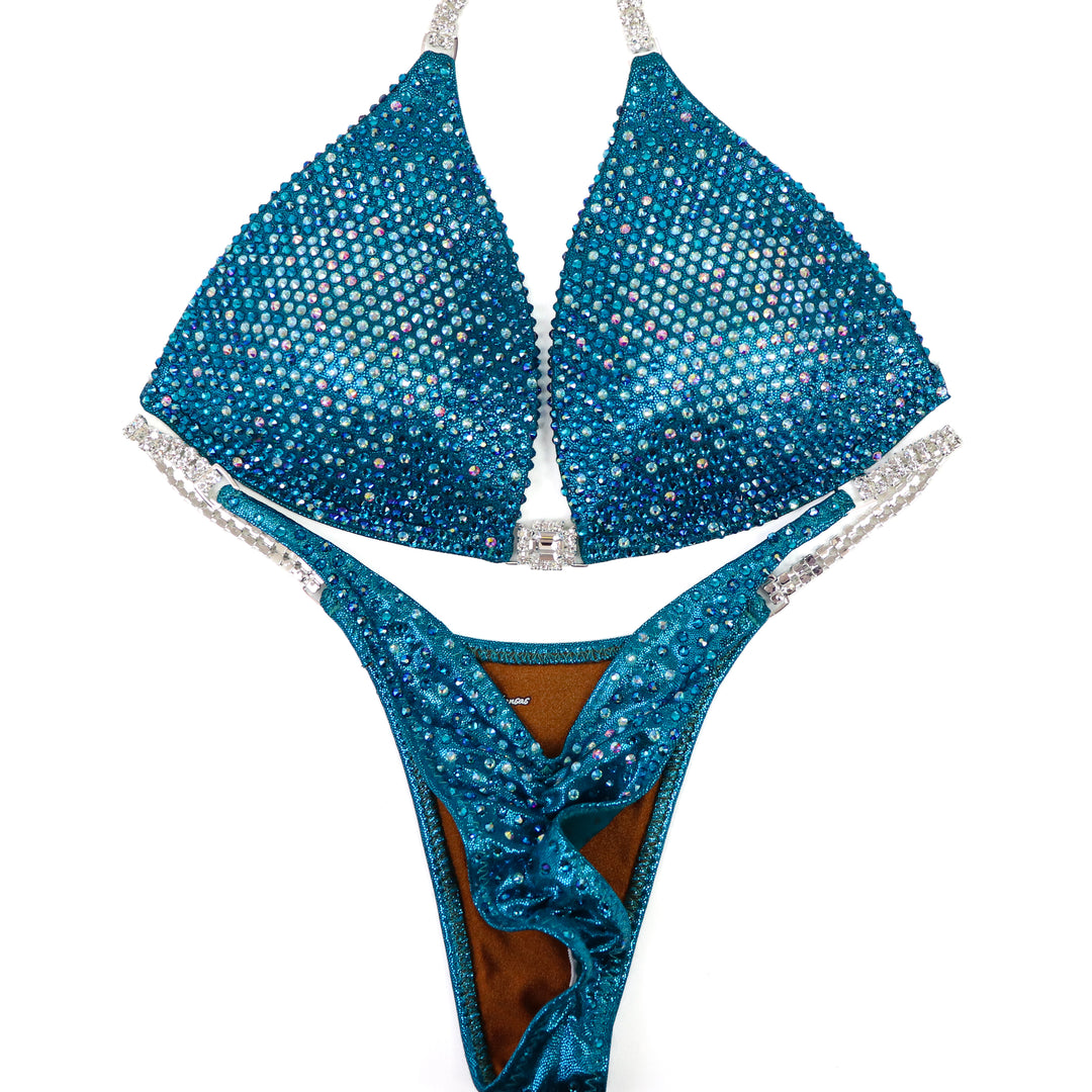 QS ST: Teal Nova. Medium Molded/Pro.  Angel Competition BikinisThe best NPC Competition Suits for the Bikini Division, Fit Model Division Suits, and bodybuilding suits.