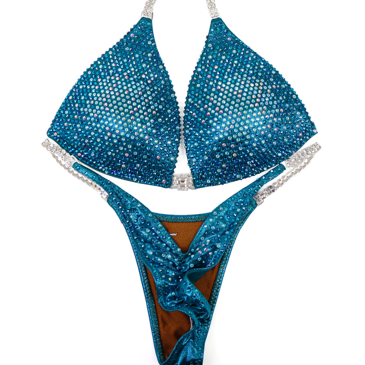 QS ST: Teal Nova. Medium Molded/Pro.  Angel Competition BikinisThe best NPC Competition Suits for the Bikini Division, Fit Model Division Suits, and bodybuilding suits.