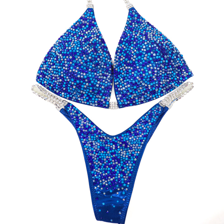 QS ST: Neon Blue Horizon Radiance. Medium Molded/Pro.  Angel Competition BikinisThe best NPC Competition Suits for the Bikini Division, Fit Model Division Suits, and bodybuilding suits.