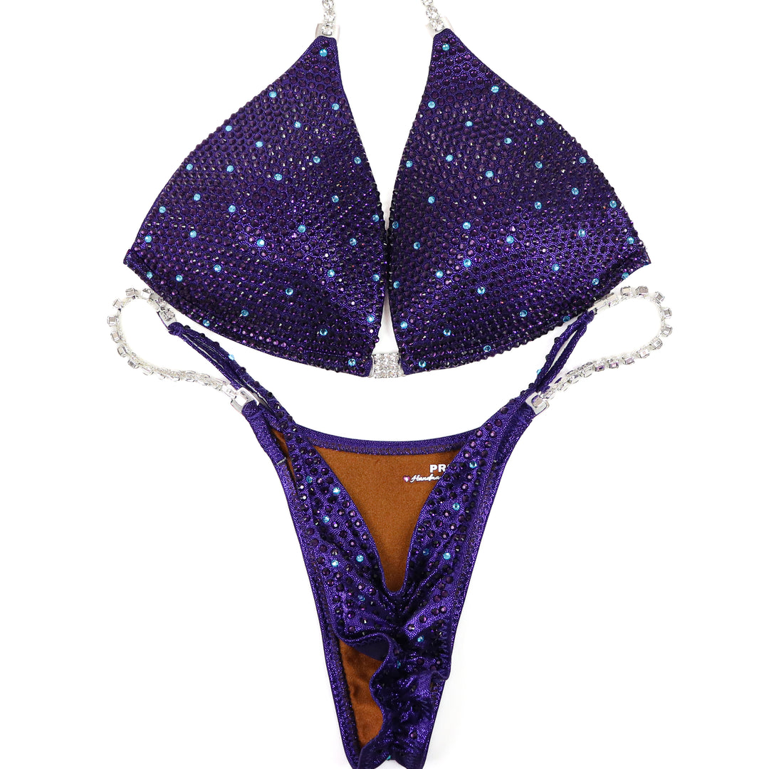 QS ST: Violet Vortex Shimmer. Hologram Eggplant. Medium Molded/Pro.  Angel Competition BikinisThe best NPC Competition Suits for the Bikini Division, Fit Model Division Suits, and bodybuilding suits.