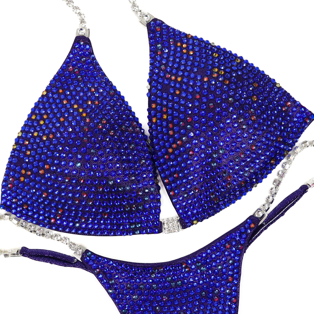 QS ST: Royal Radiant Pro. Hologram Eggplant. Medium Molded/Pro.  Angel Competition BikinisThe best NPC Competition Suits for the Bikini Division, Fit Model Division Suits, and bodybuilding suits.