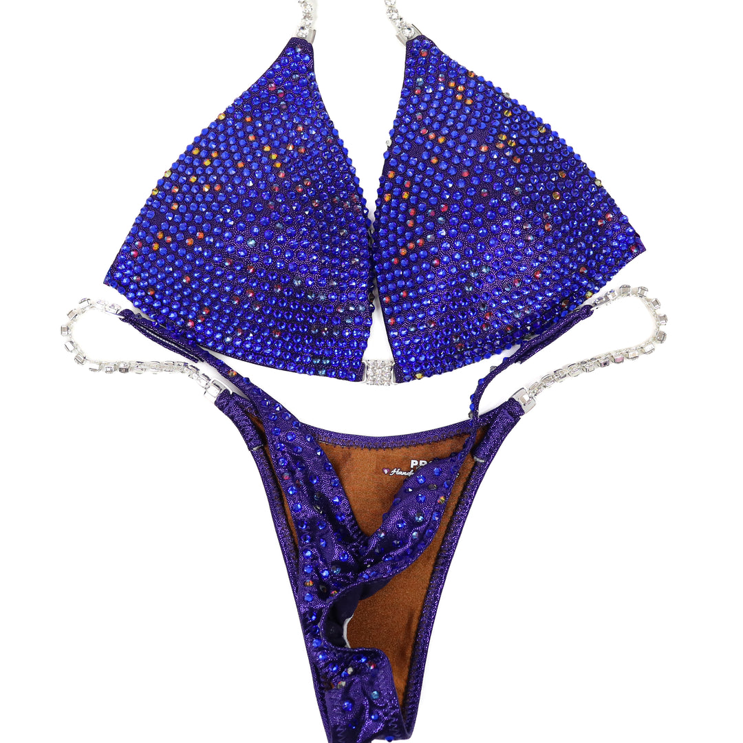 QS ST: Royal Radiant Pro. Hologram Eggplant. Medium Molded/Pro.  Angel Competition BikinisThe best NPC Competition Suits for the Bikini Division, Fit Model Division Suits, and bodybuilding suits.