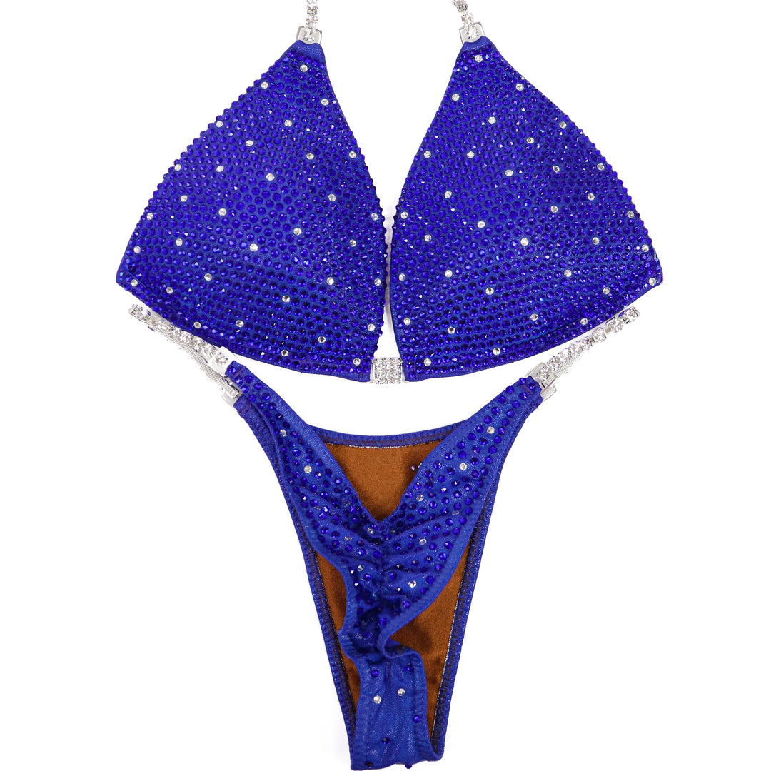 QS ST: Electric Shine Shimmer. Hologram Electric Purple. Medium Molded/Pro.  Angel Competition BikinisThe best NPC Competition Suits for the Bikini Division, Fit Model Division Suits, and bodybuilding suits.