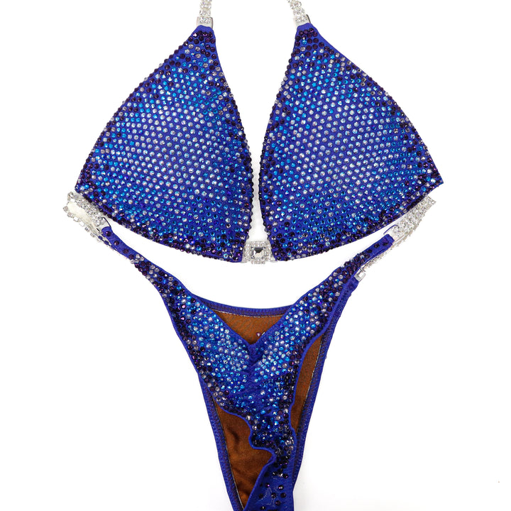 QS ST: Savana's Midnight Sunset Nova. Medium Molded/Pro.  Angel Competition BikinisThe best NPC Competition Suits for the Bikini Division, Fit Model Division Suits, and bodybuilding suits.
