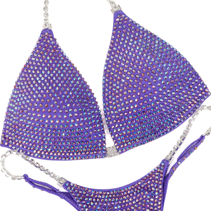 QS ST: Lilac Lustre Diamond Pro. Matte Lilac. Light Amethyst AB. Medium Molded/Pro.  Angel Competition BikinisThe best NPC Competition Suits for the Bikini Division, Fit Model Division Suits, and bodybuilding suits.