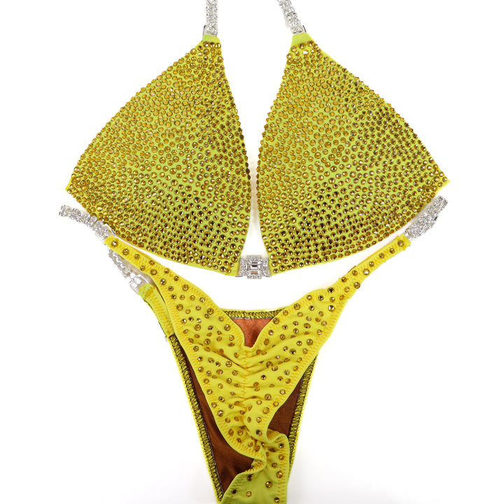 QS ST: True Yellow Radiance. Hologram Yellow. Medium Molded/Pro.  Angel Competition BikinisThe best NPC Competition Suits for the Bikini Division, Fit Model Division Suits, and bodybuilding suits.