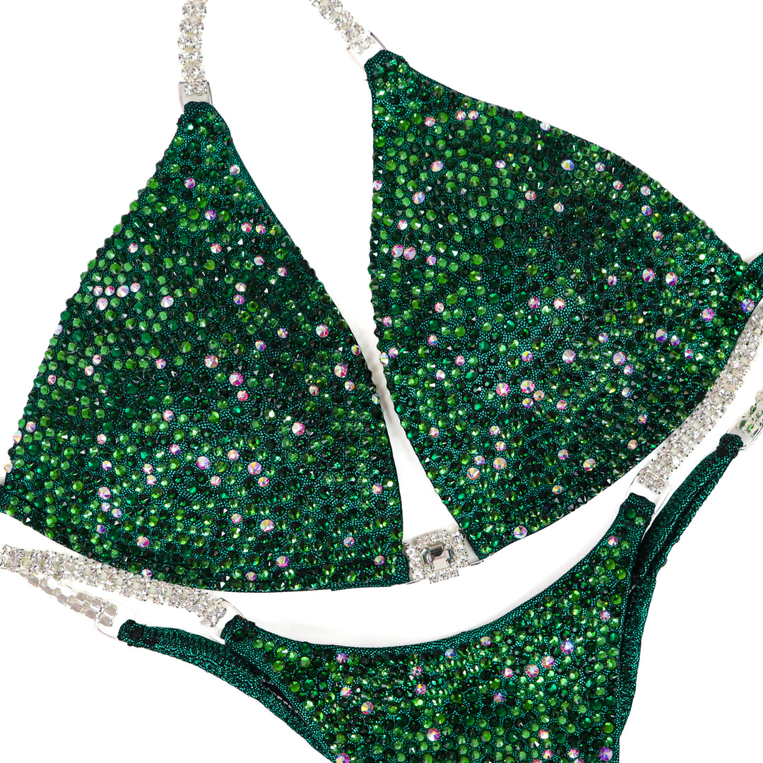 QS ST: Emerald Radiance. Hologram Emerald. Medium Molded/Pro.  Angel Competition BikinisThe best NPC Competition Suits for the Bikini Division, Fit Model Division Suits, and bodybuilding suits.