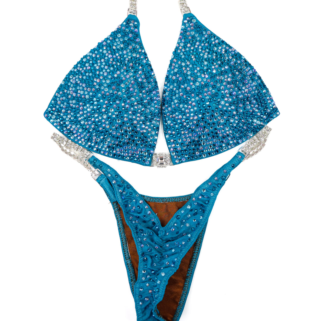 QS ST: Lauren's Turquoise Radiance. Medium Molded/Pro.  Angel Competition BikinisThe best NPC Competition Suits for the Bikini Division, Fit Model Division Suits, and bodybuilding suits.