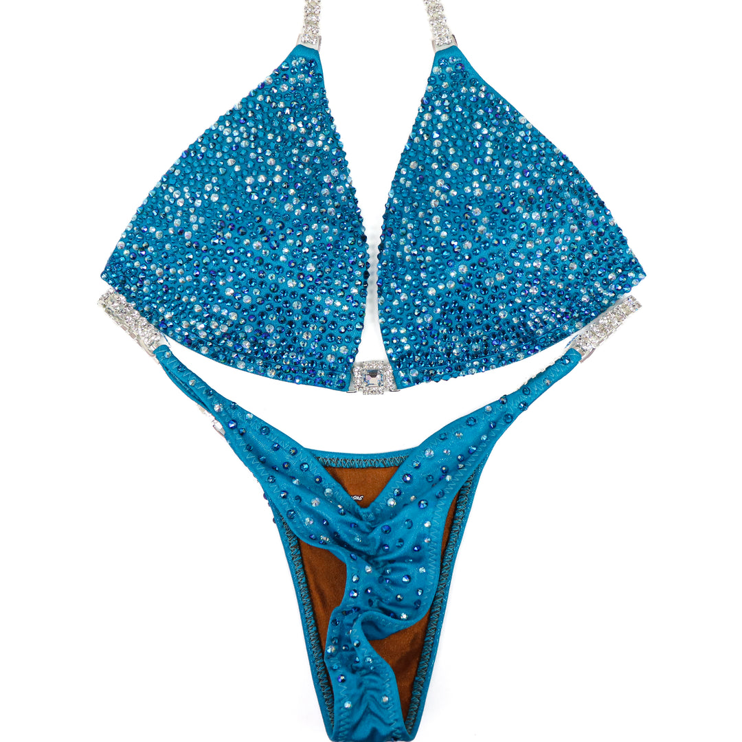 QS ST: Ocean Water Radiance. Medium Molded/Pro.  Angel Competition BikinisThe best NPC Competition Suits for the Bikini Division, Fit Model Division Suits, and bodybuilding suits.