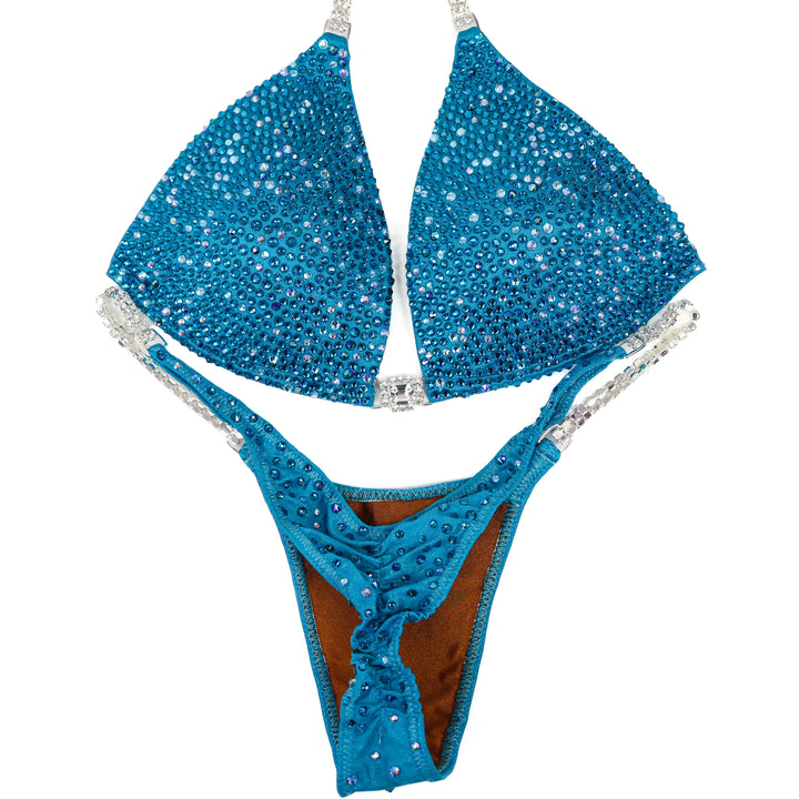 QS ST: Tidal Wave Radiance. Medium Molded/Pro.  Angel Competition BikinisThe best NPC Competition Suits for the Bikini Division, Fit Model Division Suits, and bodybuilding suits.