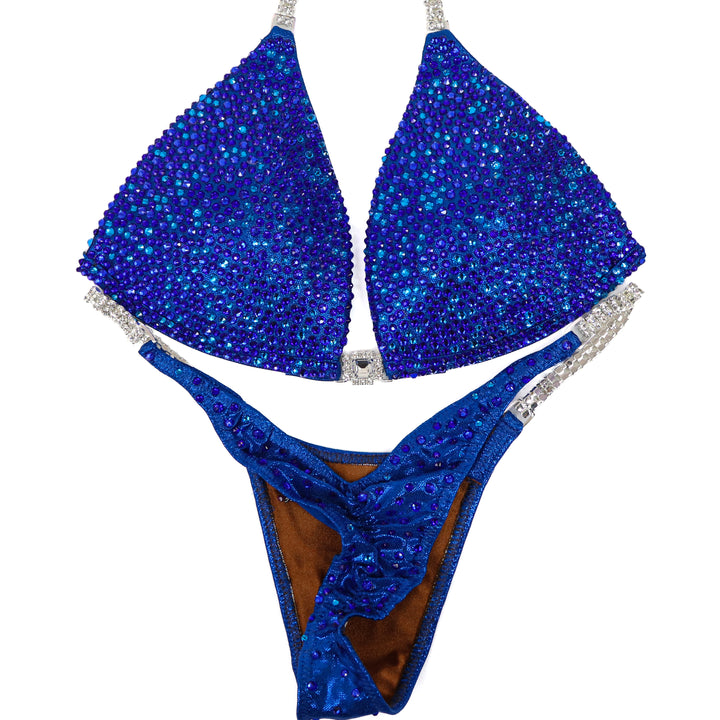 QS ST: Dazzlebolt Blue Radiance. Medium Molded/Pro.  Angel Competition BikinisThe best NPC Competition Suits for the Bikini Division, Fit Model Division Suits, and bodybuilding suits.