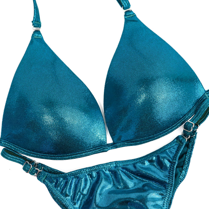 QS ST: Hologram Teal Posing Practice Suit. Small Molded/Fit Model 1.  Angel Competition BikinisThe best NPC Competition Suits for the Bikini Division, Fit Model Division Suits, and bodybuilding suits.