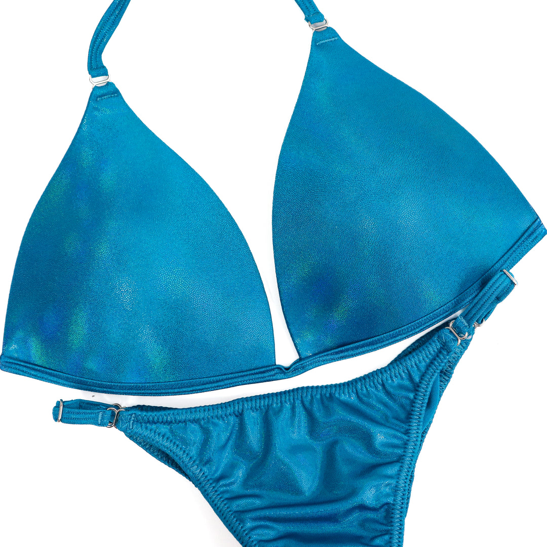 QS ST: Hologram Turquoise Fit Model Suit. Medium Molded/Fit Model 2.  Angel Competition BikinisThe best NPC Competition Suits for the Bikini Division, Fit Model Division Suits, and bodybuilding suits.