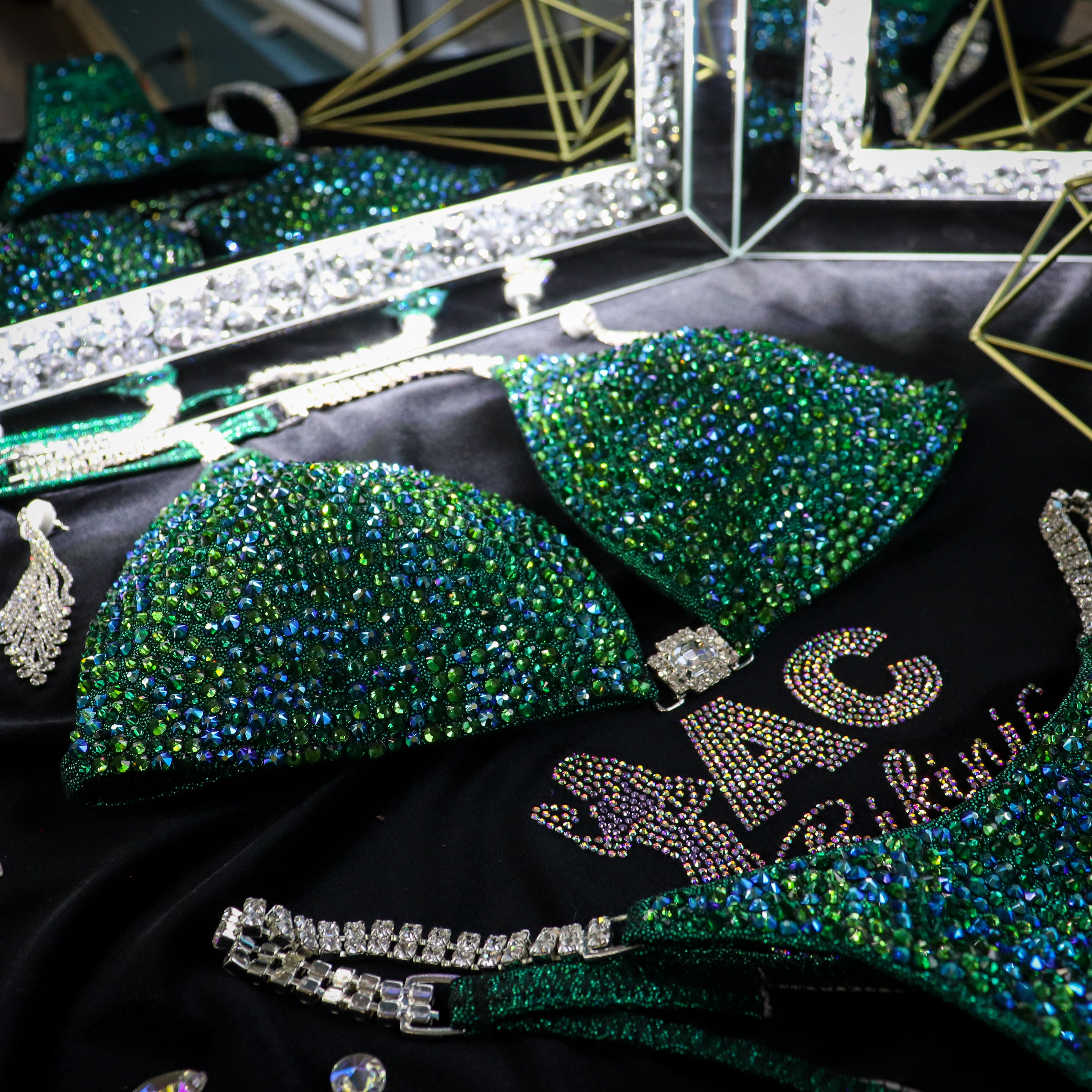 Kimber's Lucky Charm Radiance  Angel Competition BikinisThe best NPC Competition Suits for the Bikini Division, Fit Model Division Suits, and bodybuilding suits.