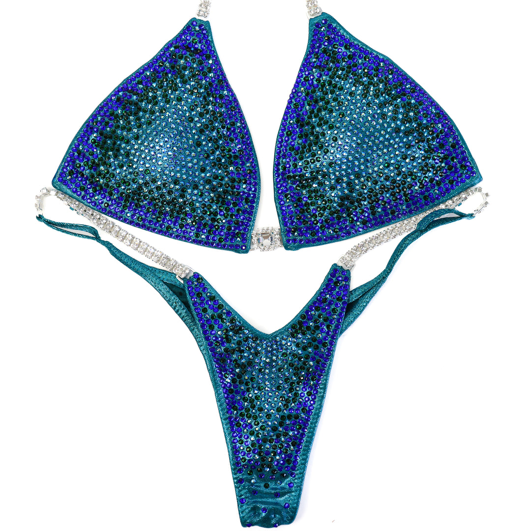 QS ST: Crystal Nova 3 Color. Hologram Teal. Medium/Pro.  Angel Competition BikinisThe best NPC Competition Suits for the Bikini Division, Fit Model Division Suits, and bodybuilding suits.