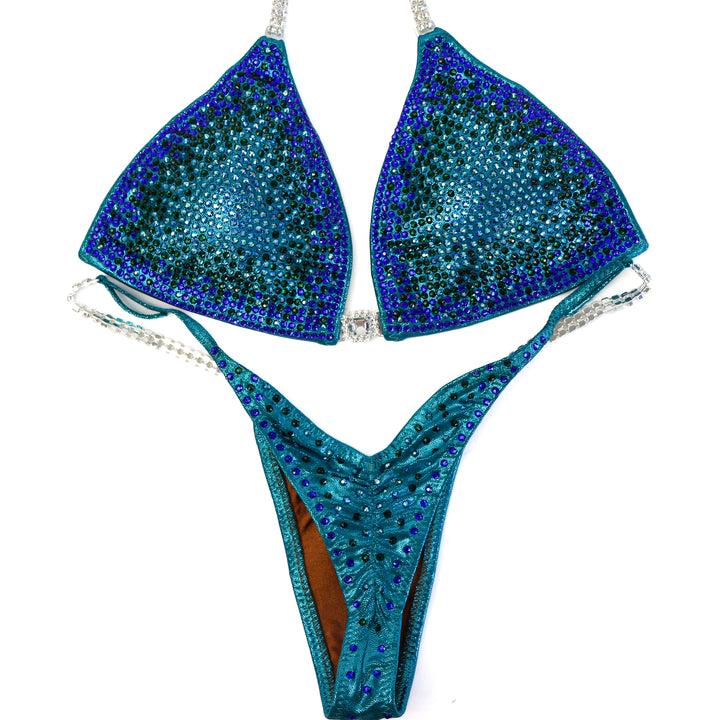 QS ST: Crystal Nova 3 Color. Hologram Teal. Medium/Pro.  Angel Competition BikinisThe best NPC Competition Suits for the Bikini Division, Fit Model Division Suits, and bodybuilding suits.