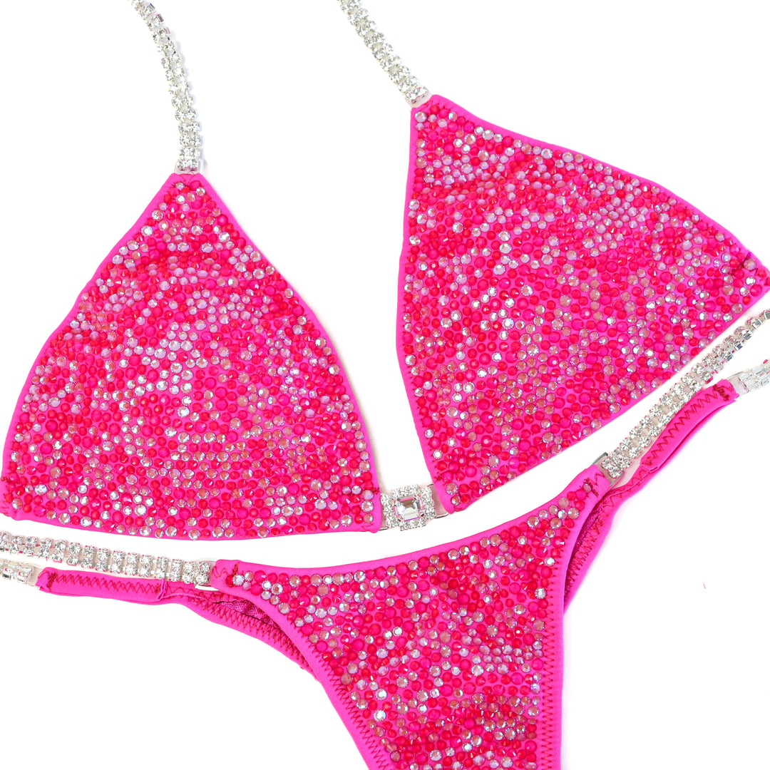 The Ultimate Pink Radiance  Angel Competition BikinisThe best NPC Competition Suits for the Bikini Division, Fit Model Division Suits, and bodybuilding suits.