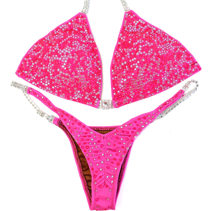 QS ST: The Ultimate Pink Radiance. Medium/Pro.  Angel Competition BikinisThe best NPC Competition Suits for the Bikini Division, Fit Model Division Suits, and bodybuilding suits.