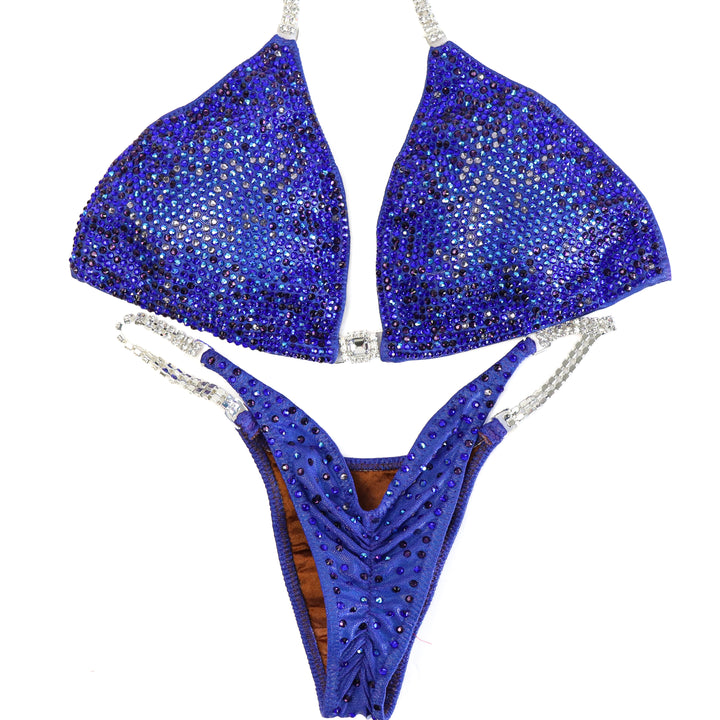 QS ST: Know Your Power Purple Nova. Large/Pro.  Angel Competition BikinisThe best NPC Competition Suits for the Bikini Division, Fit Model Division Suits, and bodybuilding suits.